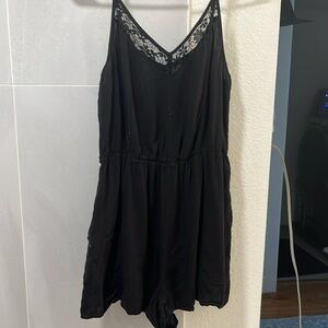 Black romper with lace trim